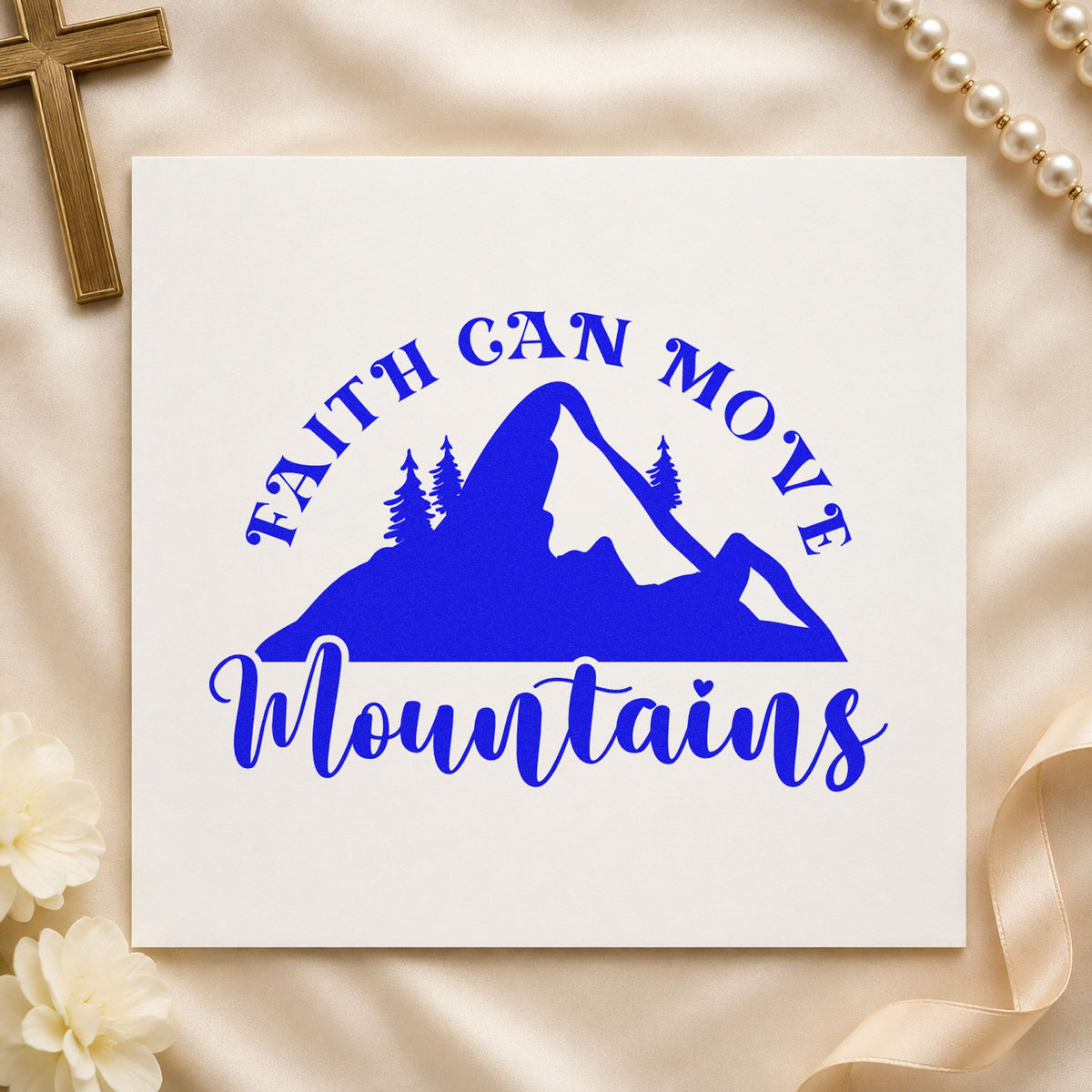 Faith Moves Mountains Silhouette craft stamp imprinted in blue ink on paper, a design suited to ski trip tags.