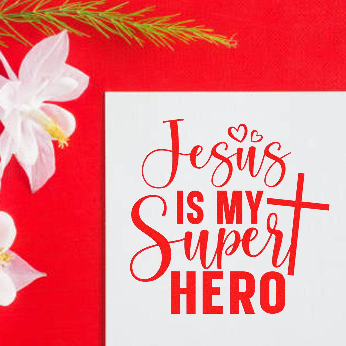 Red Jesus Is My Super Hero stamp/seal design on white card, with hearts, red background, and white flowers.