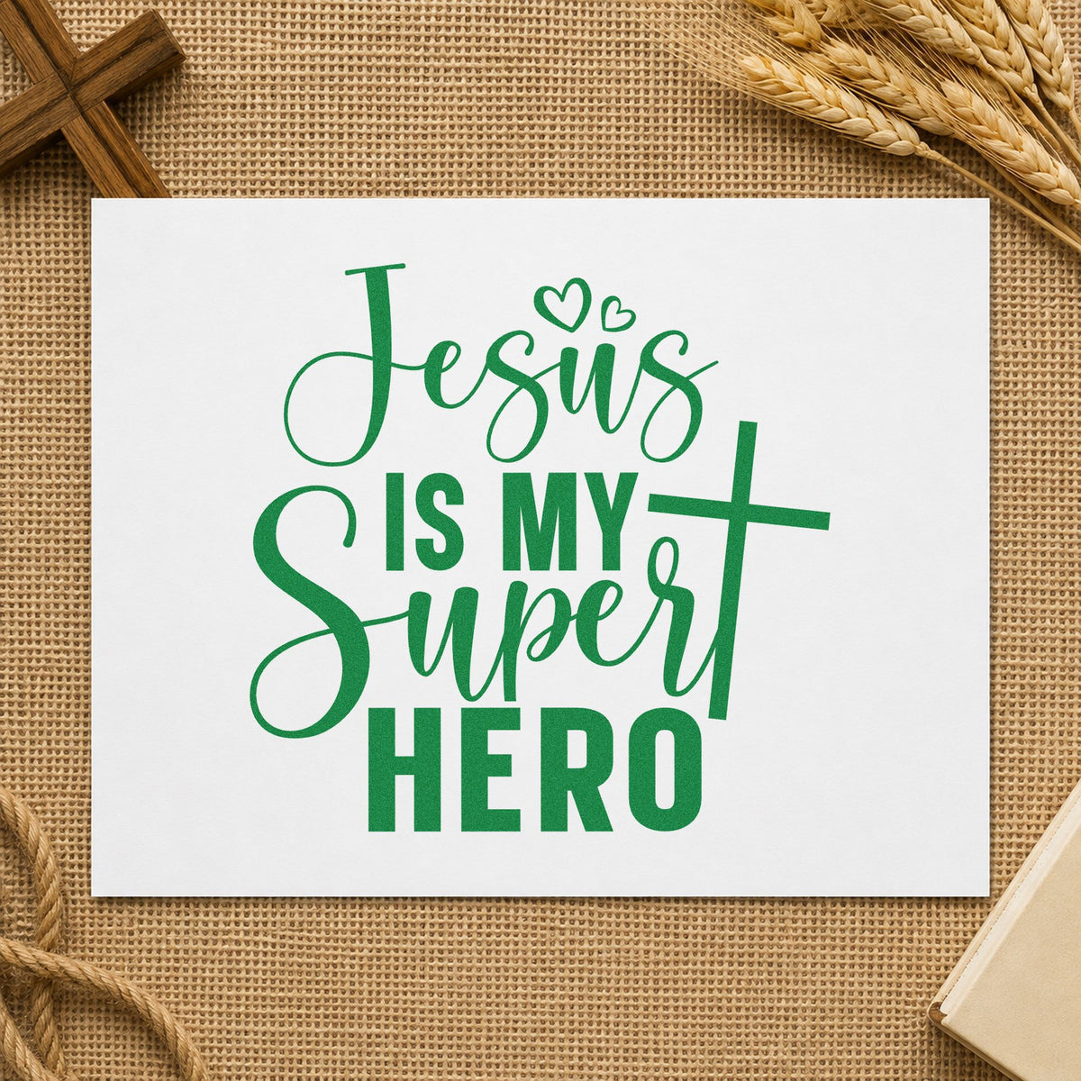 Jesus Is My Superhero craft stamp imprint in green ink on a handmade project, one idea being vbs hero week crafts.