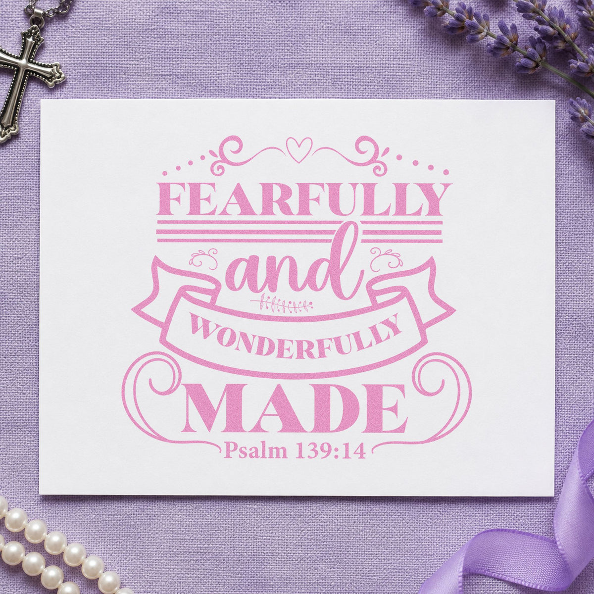 Fearfully Wonderfully Made Ribbon craft stamp in purple ink on cardstock, an easy option for gender reveal favors.