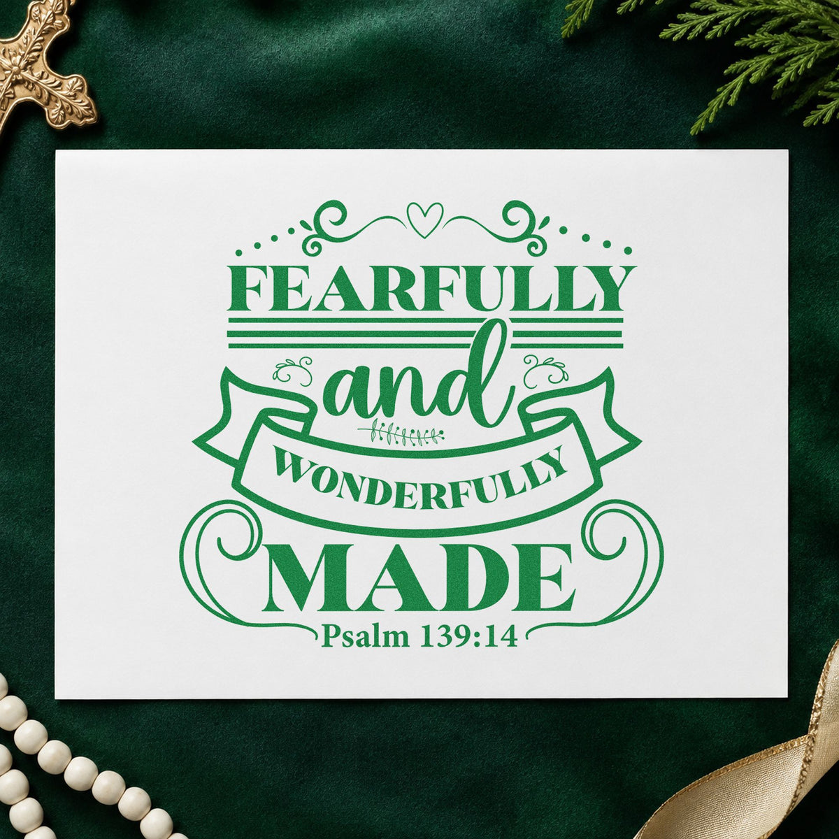 Fearfully Wonderfully Made Ribbon craft stamp imprint in green ink on a handmade project, one idea being ultrasound frame mats.