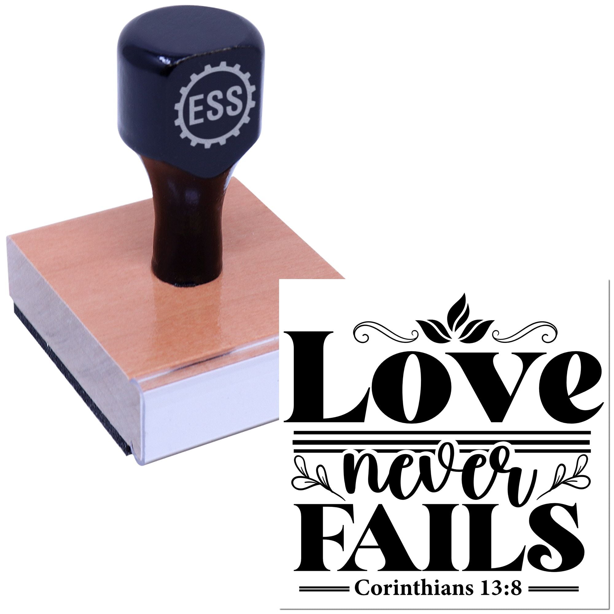 Black ESS rubber stamp on a pink sealing block, with a decorative black Love never fails seal design.