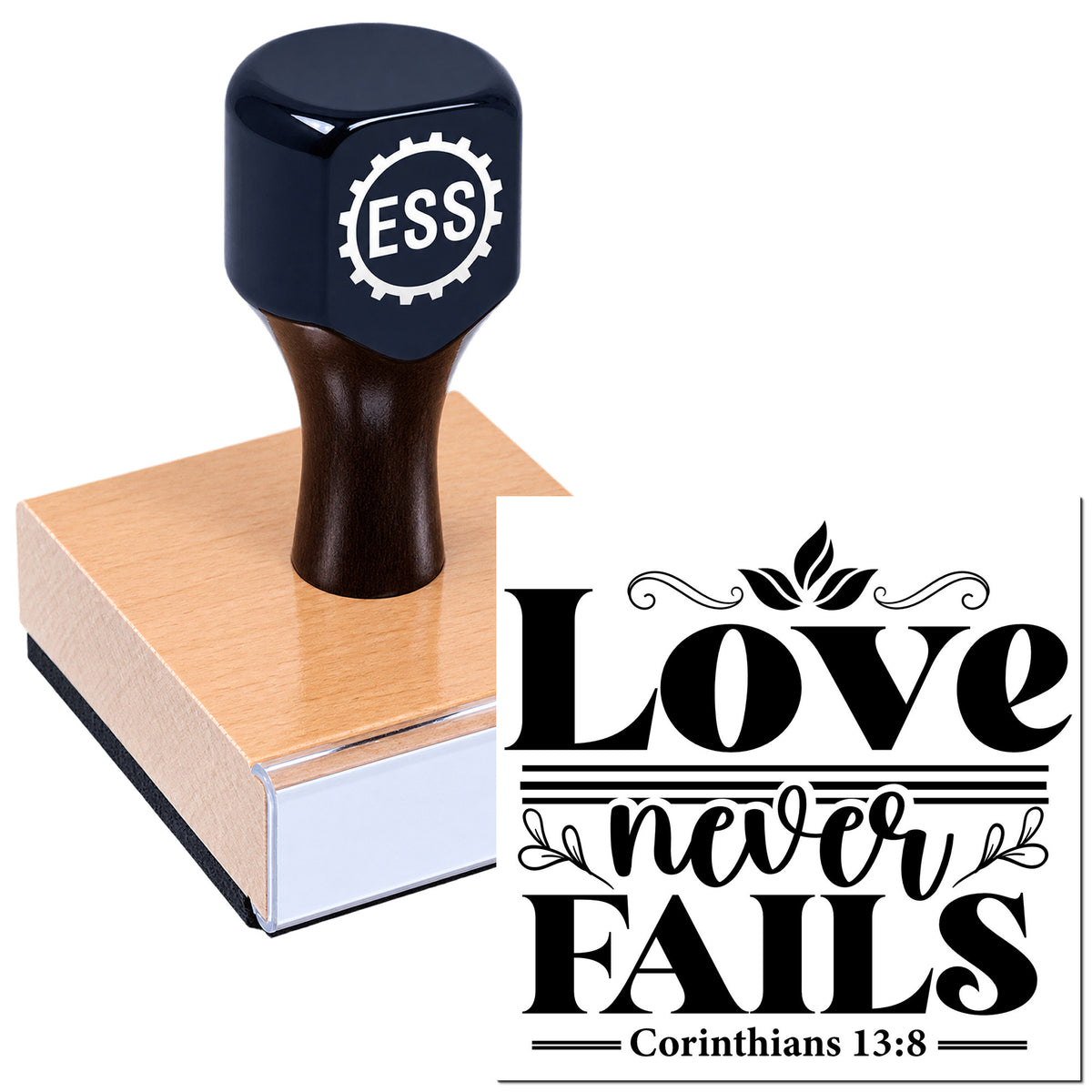 Black ESS rubber stamp on a pink sealing block, with a decorative black "Love never fails" seal design.