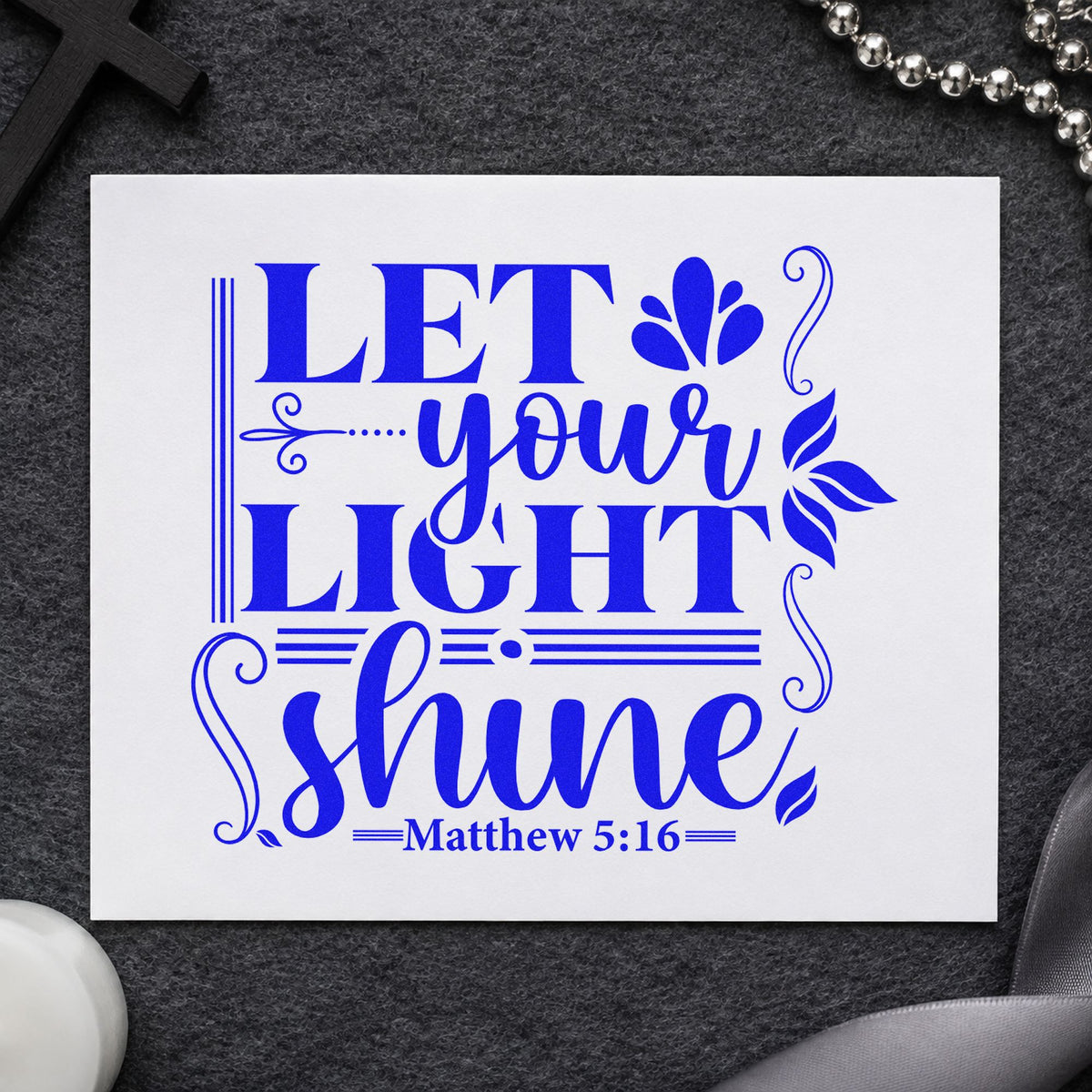 Let Your Light Shine Scrolls craft stamp imprinted in blue ink on paper, a design suited to christmas eve programs.