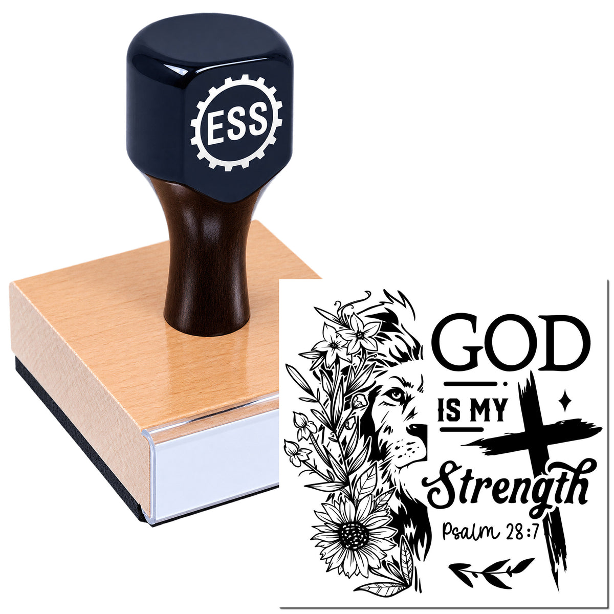 Black ESS stamp and seal on a wooden block, with a lion, flowers, and "God Is My Strength" Psalm 28:7 design.