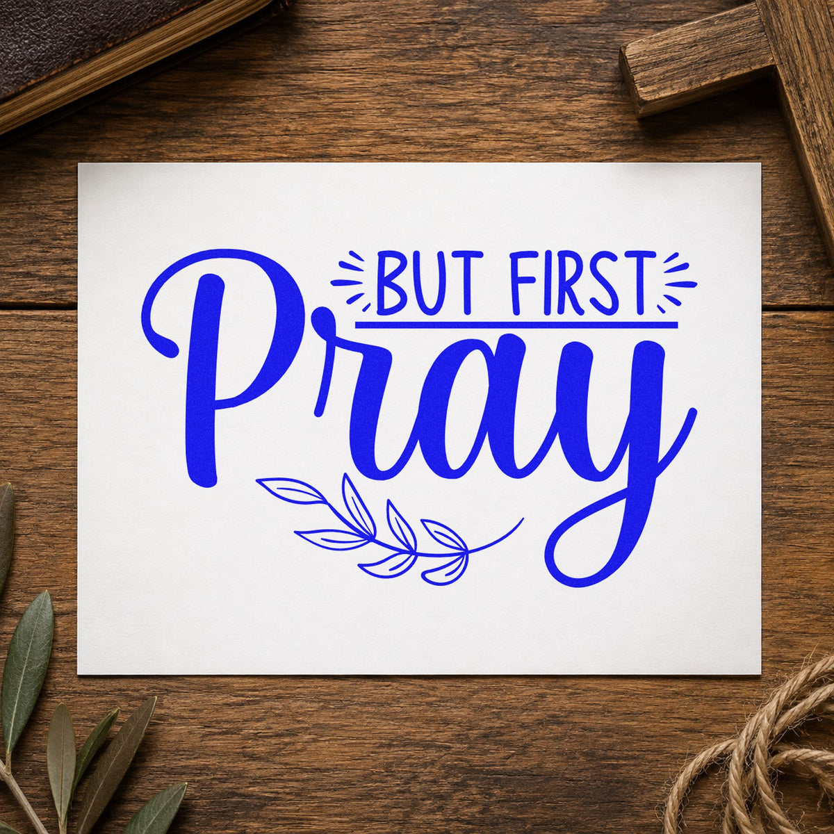 But First Pray Leaves craft stamp imprinted in blue ink on paper, a design suited to alarm clock notes.