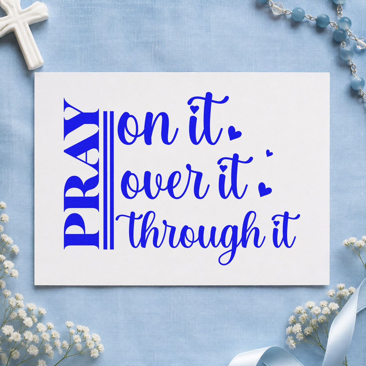 Pray on It Heart Script craft stamp in blue ink on cardstock, an easy option for tee transfers.