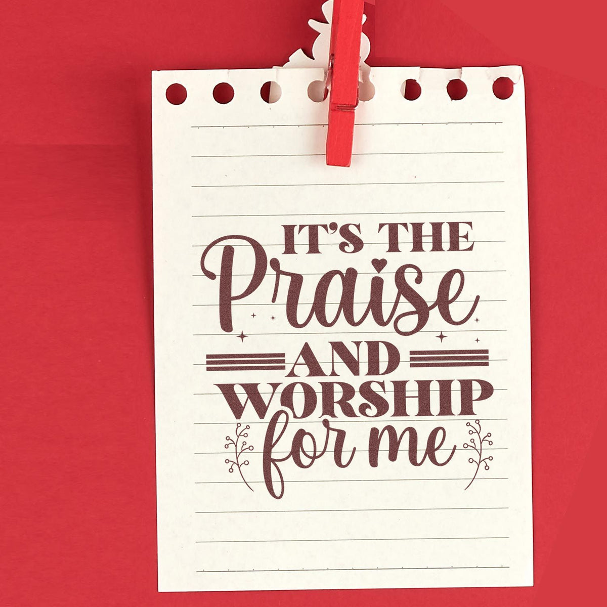 Red stamp-and-seal notepad with clipped white lined paper reading Its the Praise and Worship for me.
