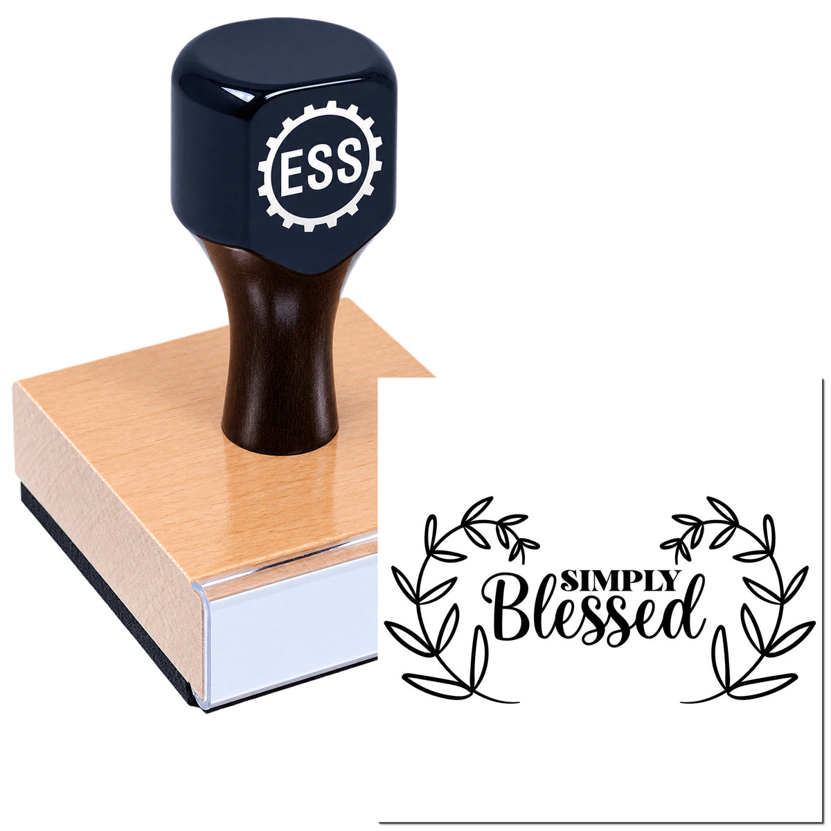 Black ESS stamp on pink rubber base, showing a "Simply Blessed" seal with leafy wreath