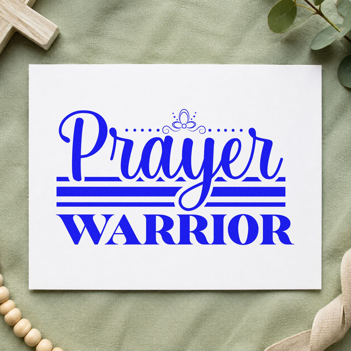 Prayer Warrior Flourish craft stamp in blue ink on cardstock, an easy option for canvas totes.