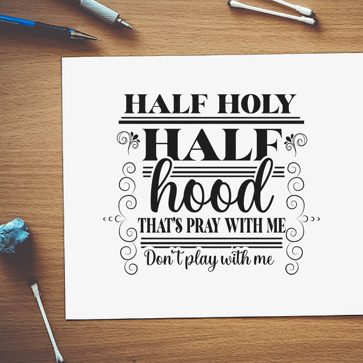 Half Holy Half Hood Scrolls Frame Accent Premium Wooden Stamp - Vintage Pro imprint stamped in black ink. Ornamental scrolls frame "Half holy half hood" and "That's pray with me, don't play with me."