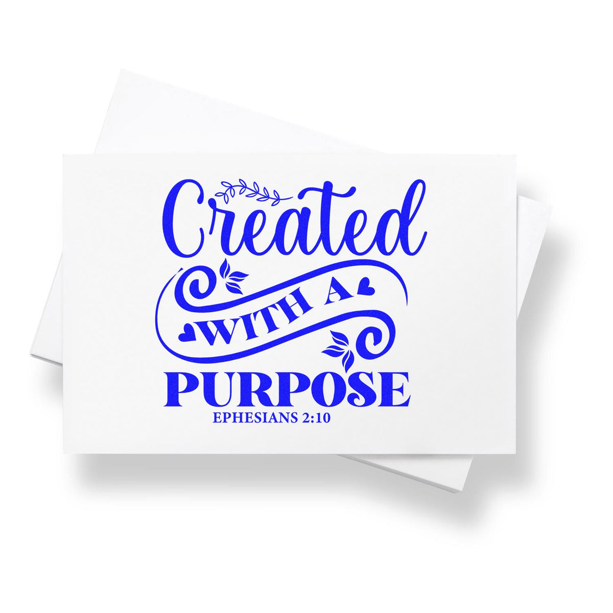 Blue custom stamp seal reading Created with a Purpose, with floral accents and Ephesians 2:10 on white paper.