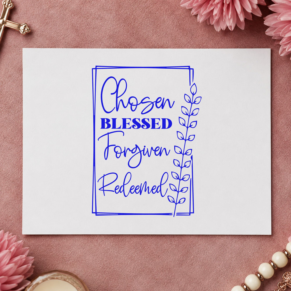 Chosen Blessed Forgiven Redeemed craft stamp imprinted in blue ink on paper, a design suited to door frame signs.
