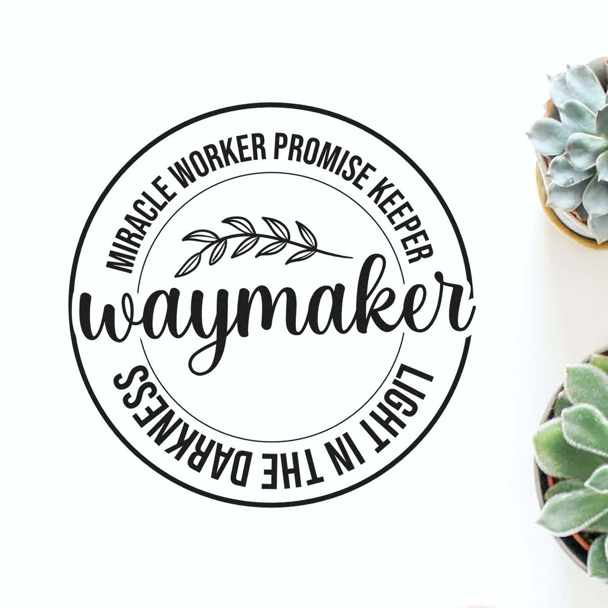 Black circular rubber stamp seal with Waymaker and Miracle Worker Promise Keeper, Light in the Darkness text, plus leaf design.