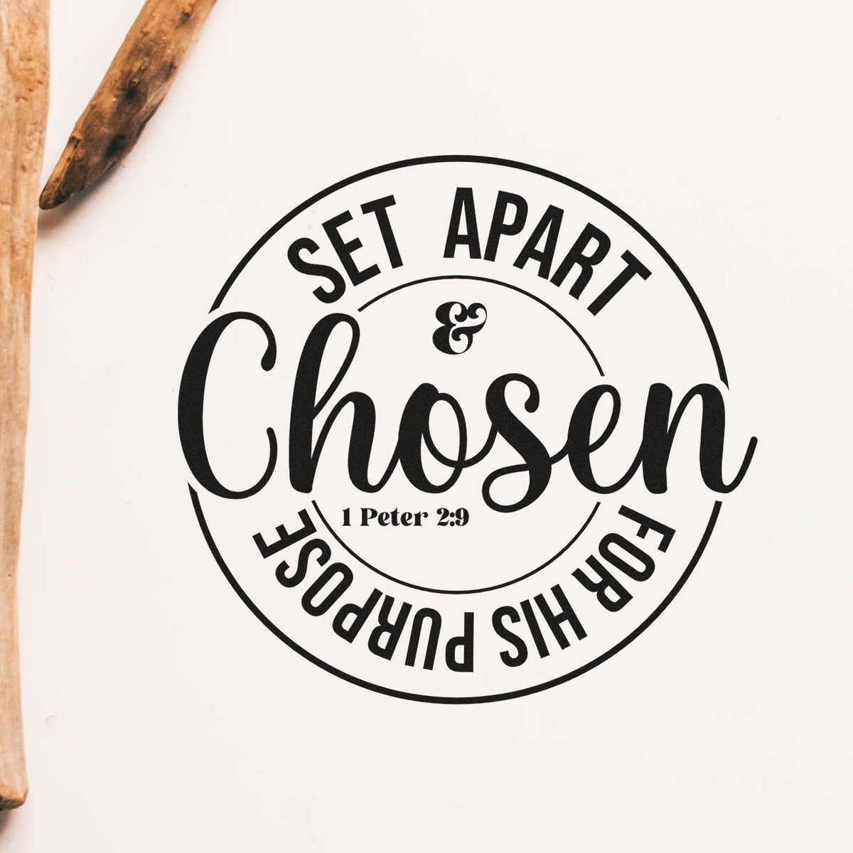 Black circular custom rubber stamp seal reading Set Apart Chosen for His Purpose with 1 Peter 2:9 on white, wood handles.