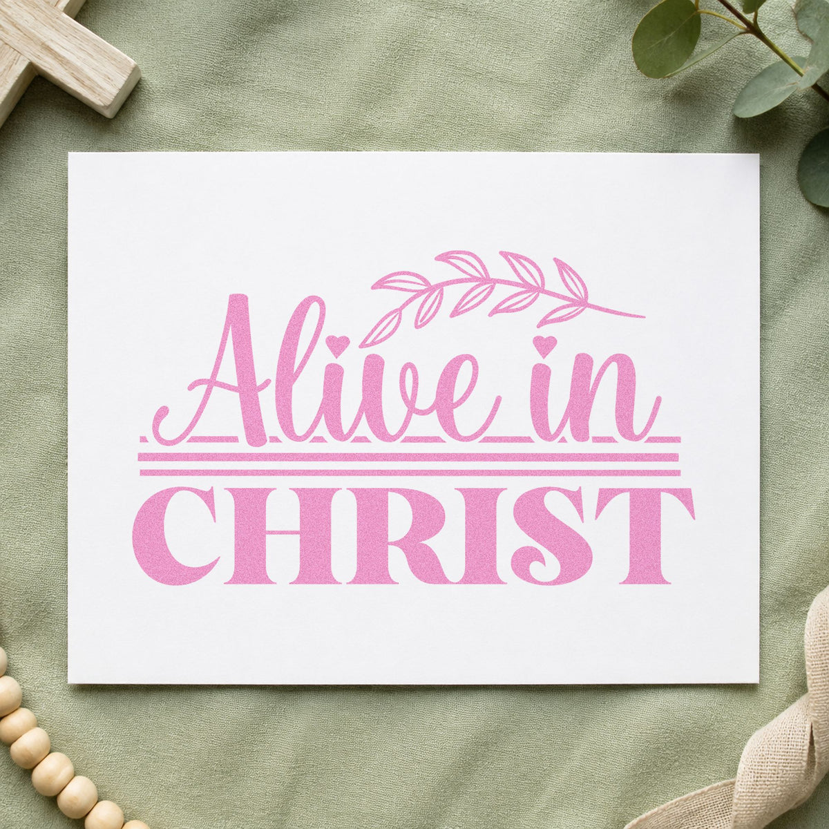 Alive in Christ craft stamp in purple ink on cardstock, an easy option for baptism gifts.