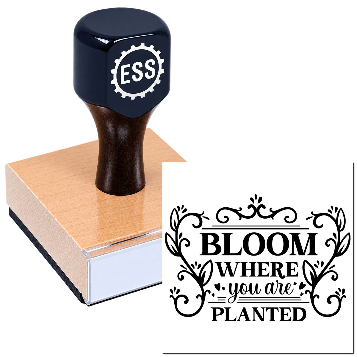 Black ESS rubber stamp on wooden handle beside decorative black seal reading "Bloom where you are planted".
