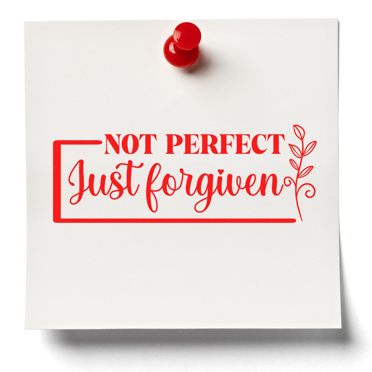 White stamp and seal card with red pushpin, reading Not Perfect Just Forgiven in bold script with a floral accent.