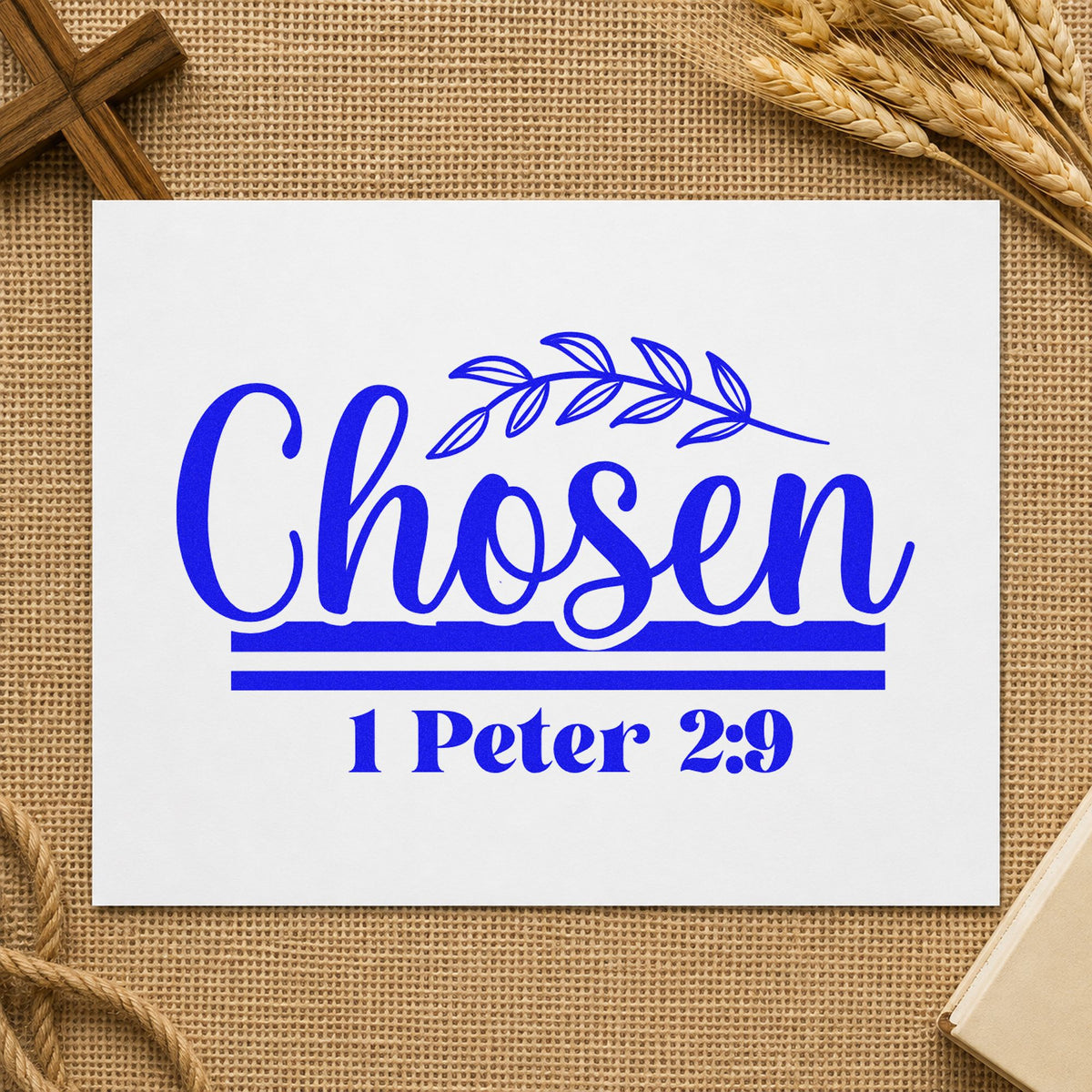 Chosen Leaf Script craft stamp imprinted in blue ink on paper, a design suited to team pick notes.