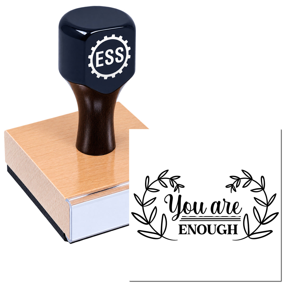 Dark navy custom stamp on wooden block with ESS logo and black "You are Enough" seal with leaf wreath.