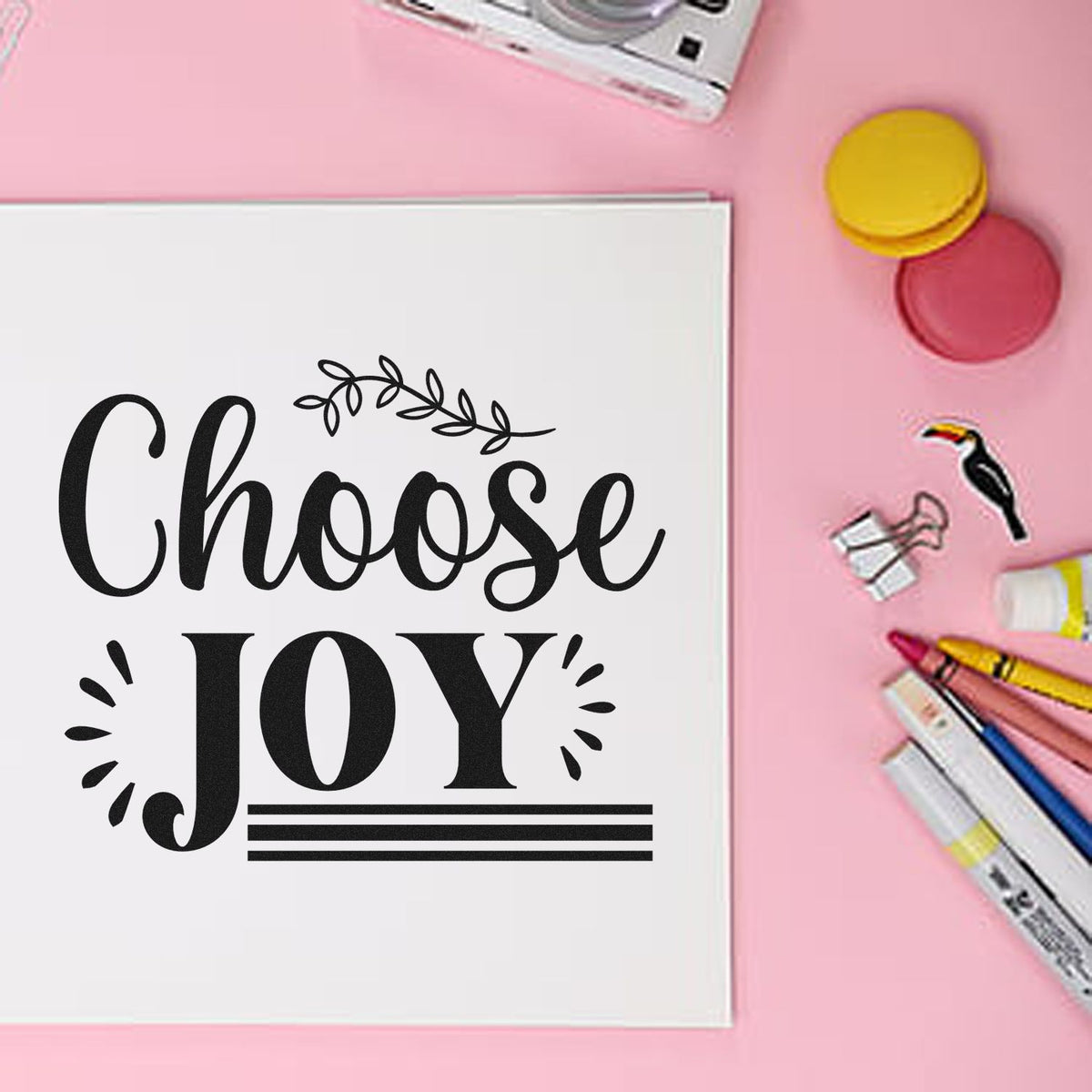Black Choose Joy stamp design on white card with pink and yellow seal products on a pink background.