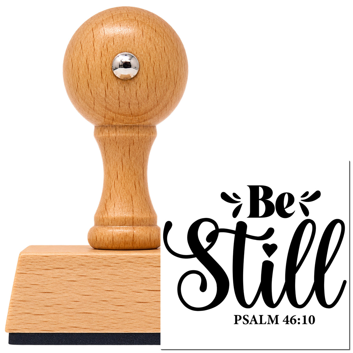 Vintage Pro beech wood stamp with a round knob handle, shown with its black Be Still imprint on white.