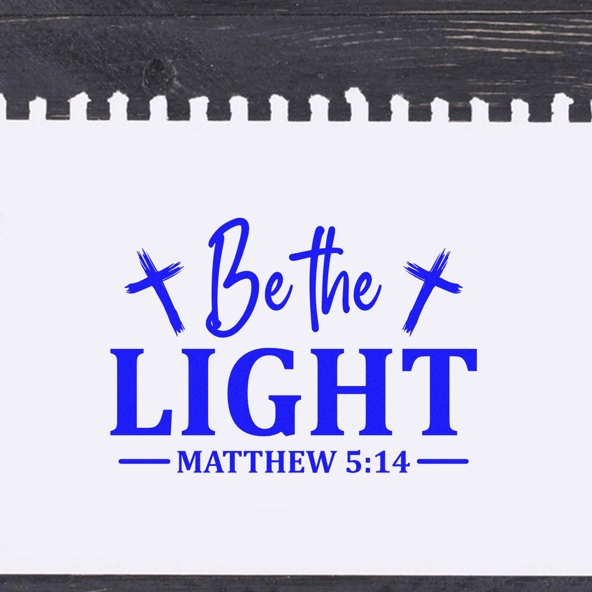 Blue religious stamp and seal reading Be the LIGHT with Matthew 5:14 on a white background.