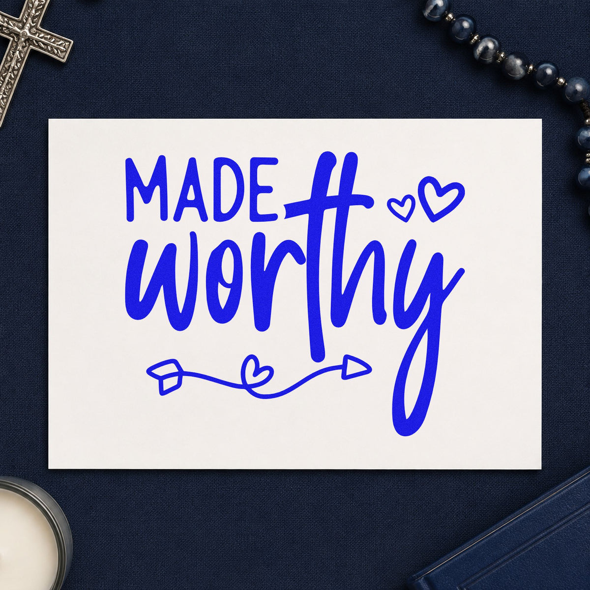 Made Worthy craft stamp imprinted in blue ink on paper, a design suited to youth retreat favors.