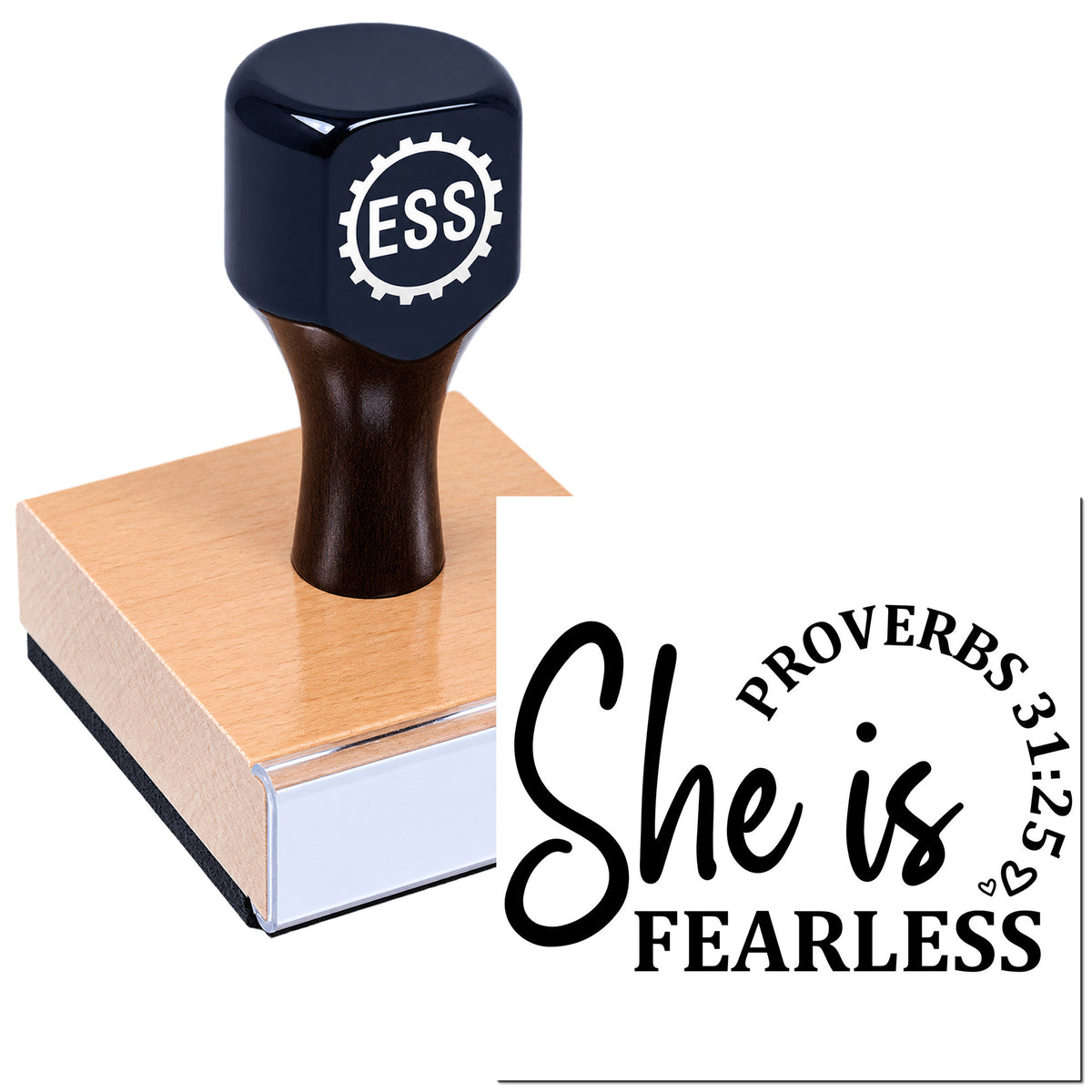 Black ESS rubber stamp on wooden block beside a white seal design reading "She is fearless" in black.