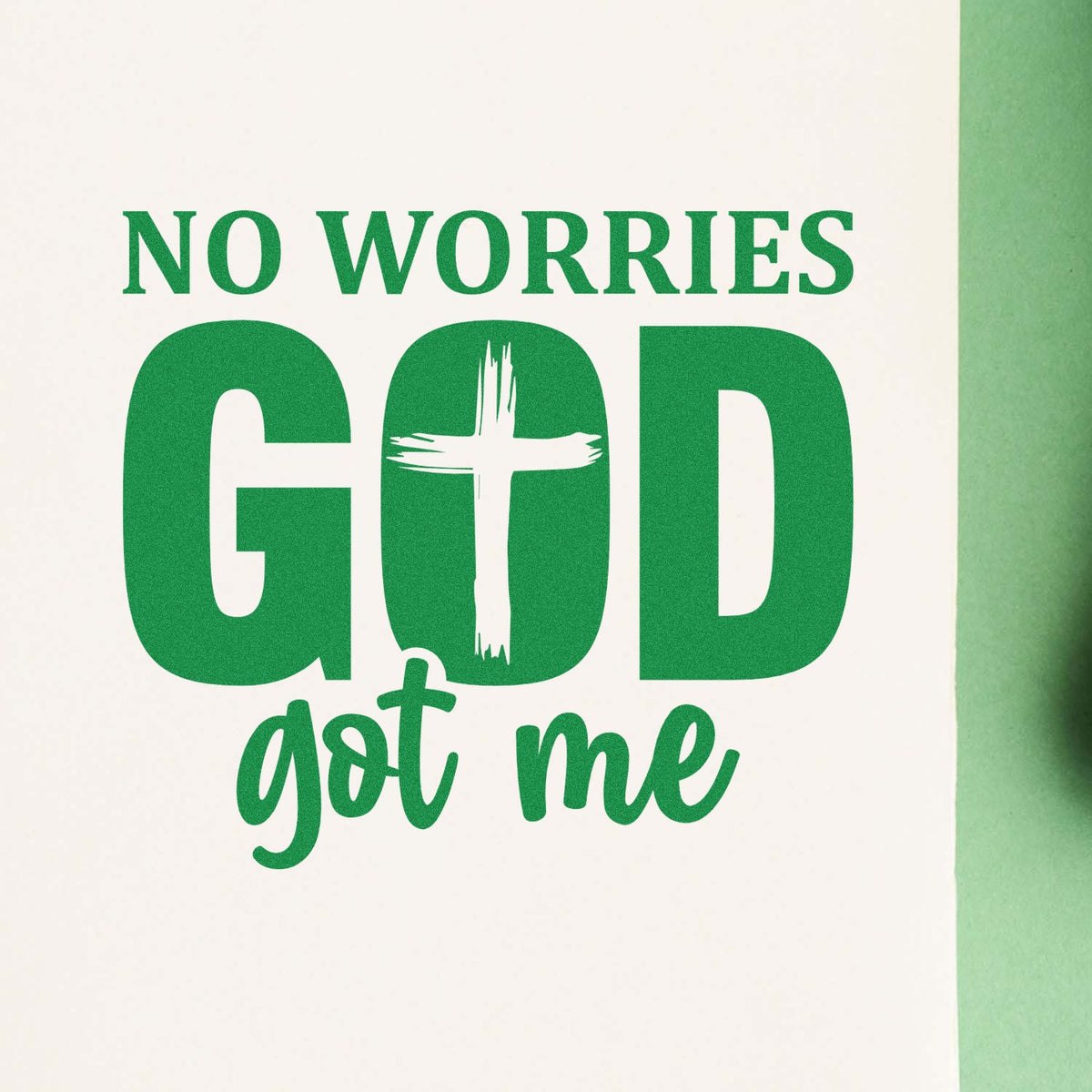 Green No Worries God Got Me stamp and seal design with white cross on a white background and green border.