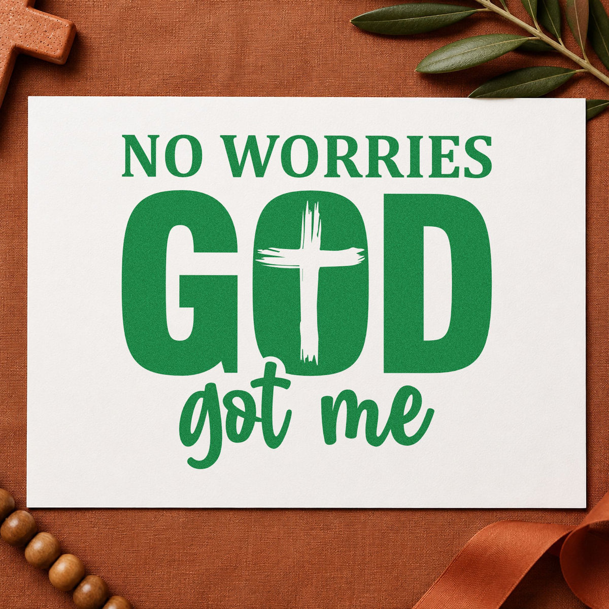 No Worries God Got Me Cross craft stamp imprint in green ink on a handmade project, one idea being kids' backpack tags.