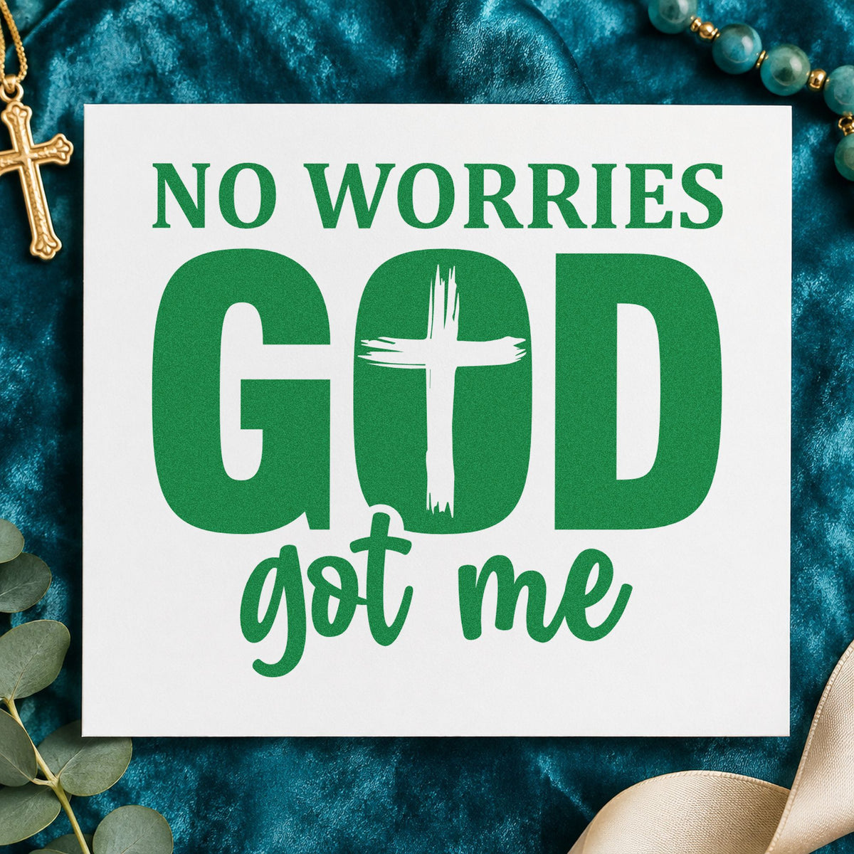 No Worries God Got Me Cross craft stamp imprint in green ink on a handmade project, one idea being fridge magnets.
