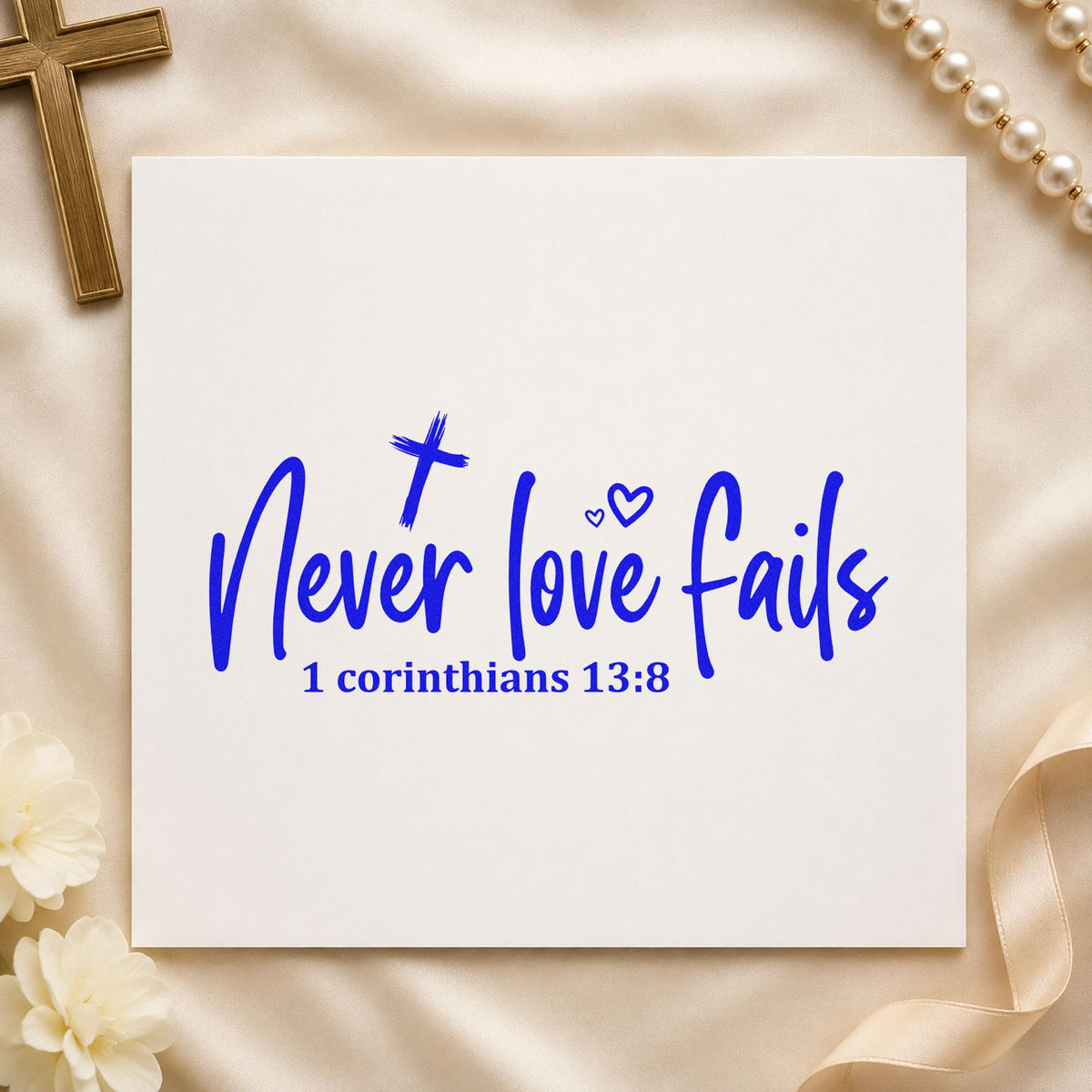 Never Love Fails craft stamp in blue ink on cardstock, an easy option for canvas totes.