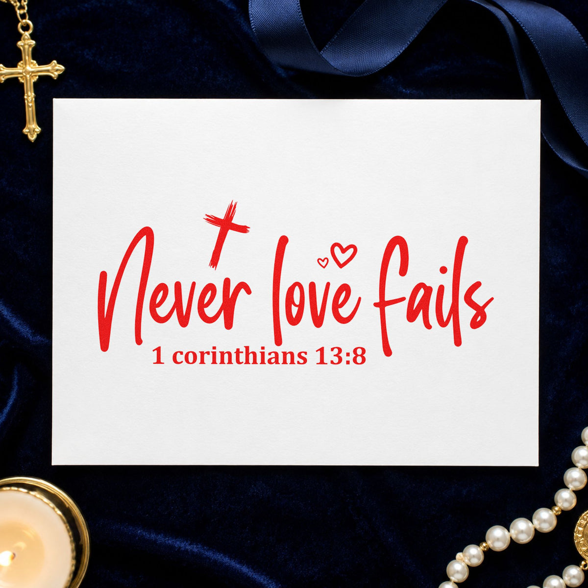 Never Love Fails rubber stamp shown in red ink, stamped for projects such as sympathy cards.