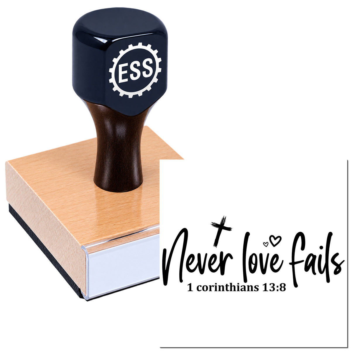 Black stamp and pink seal block with "Never love fails" and 1 Corinthians 13:8 text