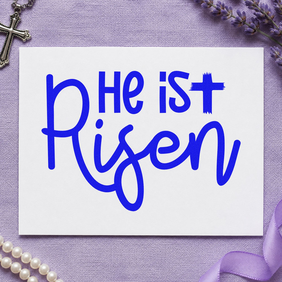 He Is Risen Script craft stamp in blue ink on cardstock, an easy option for canvas totes.