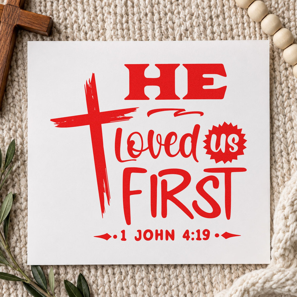 He Loved Us First rubber stamp shown in red ink, stamped for projects such as sunday school crafts.
