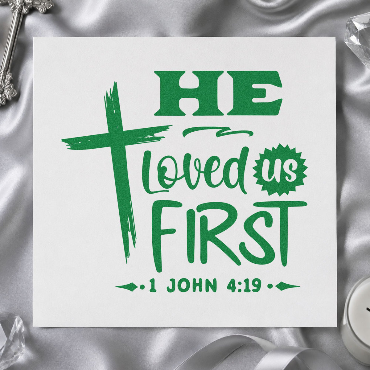 He Loved Us First craft stamp imprint in green ink on a handmade project, one idea being framed nursery art.
