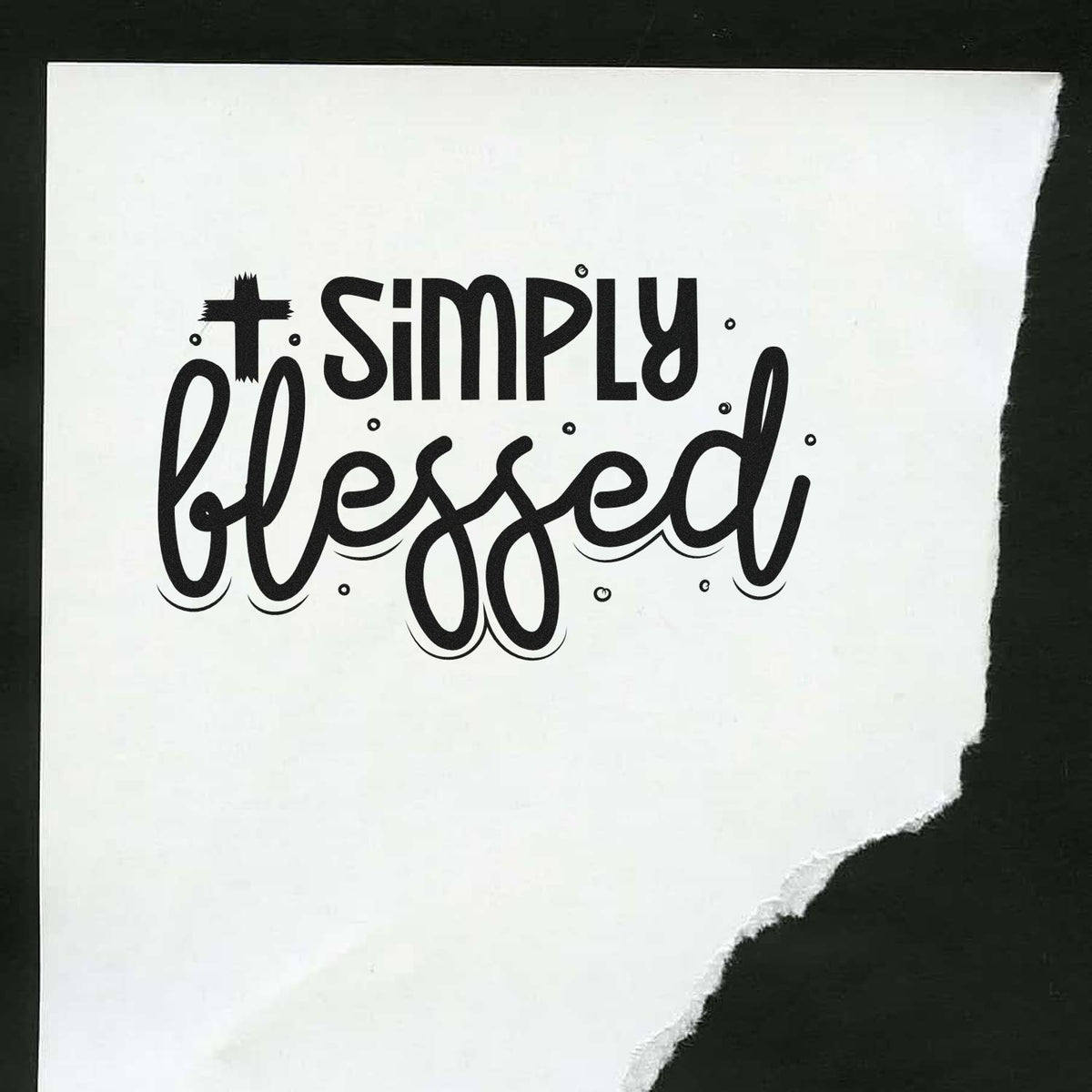 Black Simply blessed stamp and seal design on torn white paper with dark background.