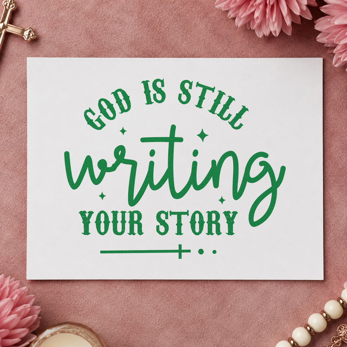 God Is Writing Your Story craft stamp imprint in green ink on a handmade project, one idea being journal cover stamping.