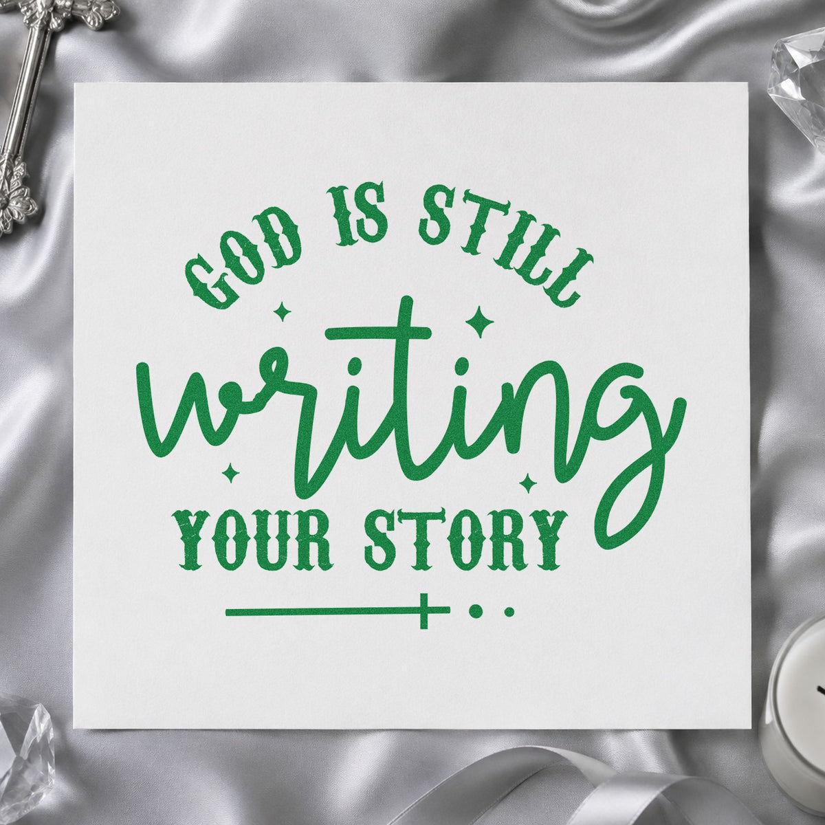 God Is Writing Your Story craft stamp imprint in green ink on a handmade project, one idea being framed library art.