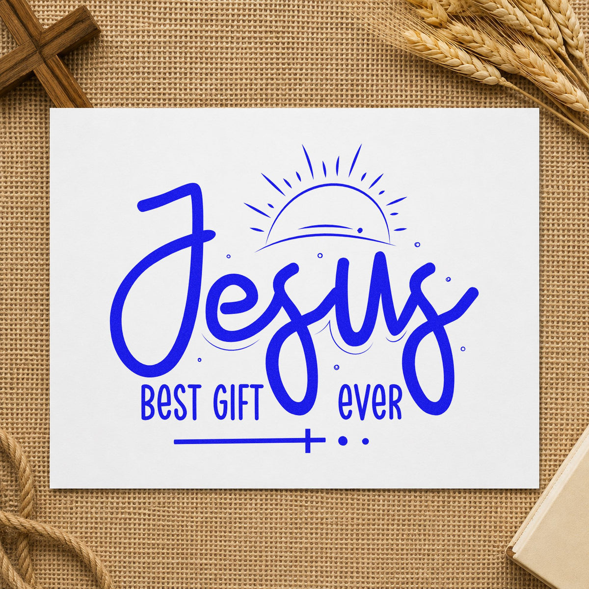 Jesus Best Gift Ever craft stamp imprinted in blue ink on paper, a design suited to wrapping paper.