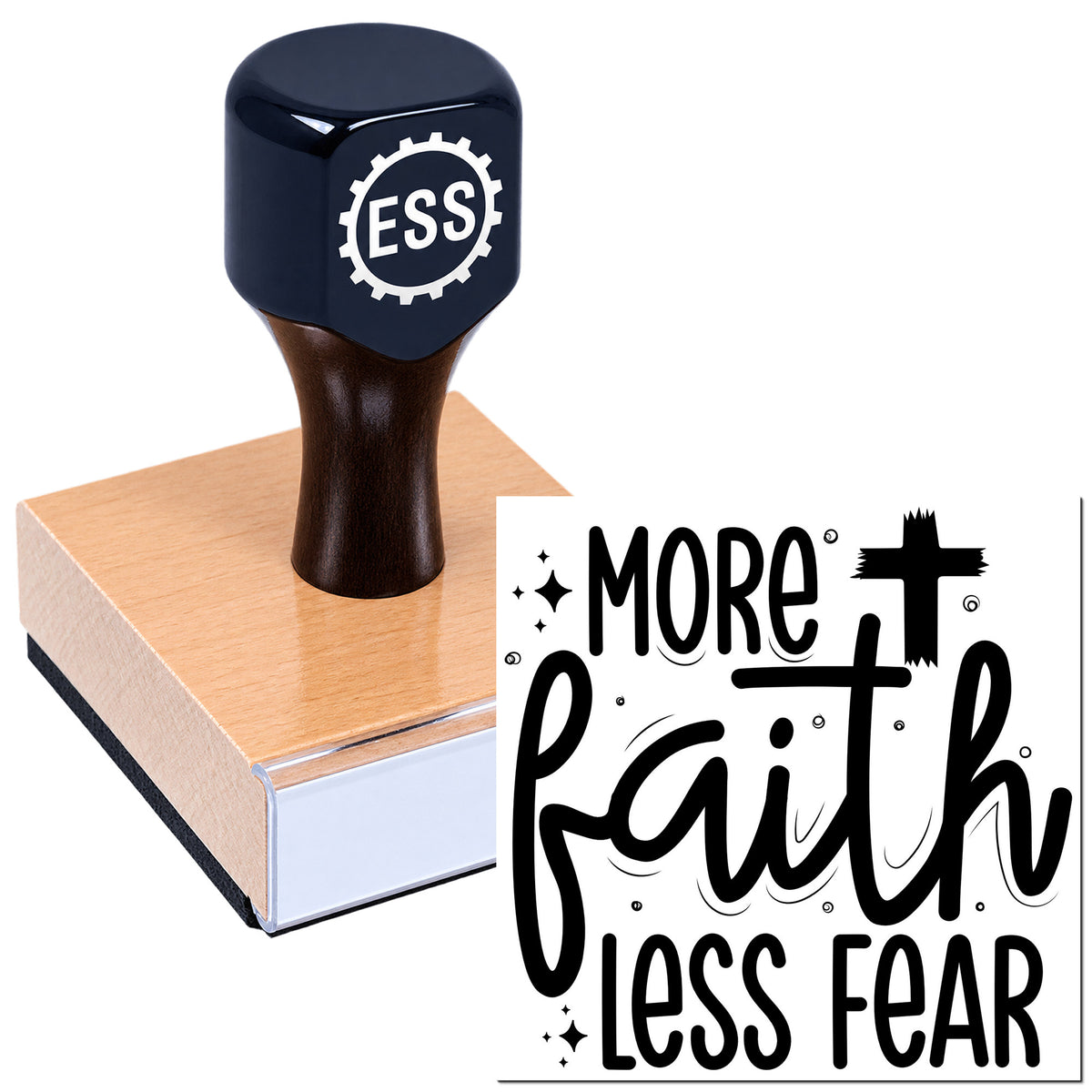 Navy rubber stamp seal with ESS logo on a pink wood base, featuring the phrase "More Faith Less Fear" in bold black lettering.