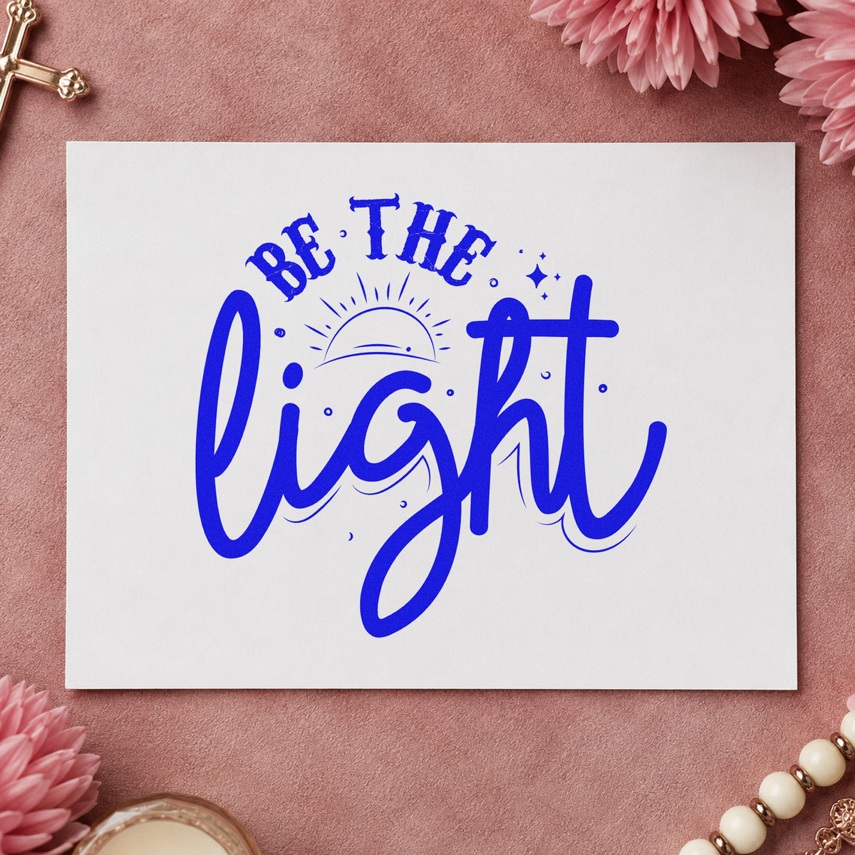 Be the Light Sunrise Script craft stamp in blue ink on cardstock, an easy option for camp counselor tees.