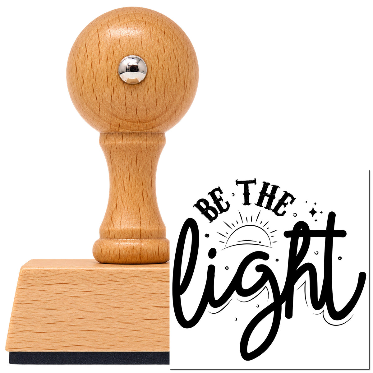 Vintage Pro beech wood stamp with a round knob handle, shown with its black Be The Light Sunrise Script imprint on white.