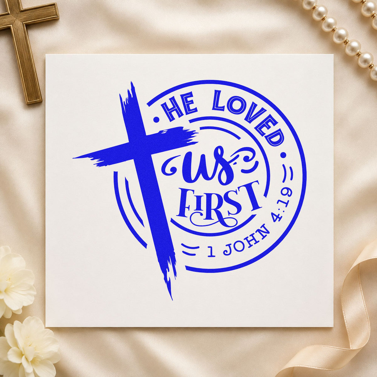 He Loved Us First Round craft stamp in blue ink on cardstock, an easy option for nursing home visits.