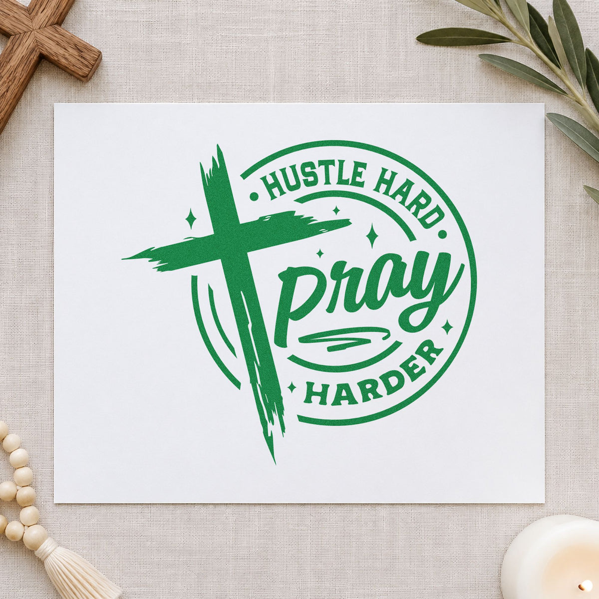 Hustle Hard Pray Harder craft stamp imprint in green ink on a handmade project, one idea being framed desk art.