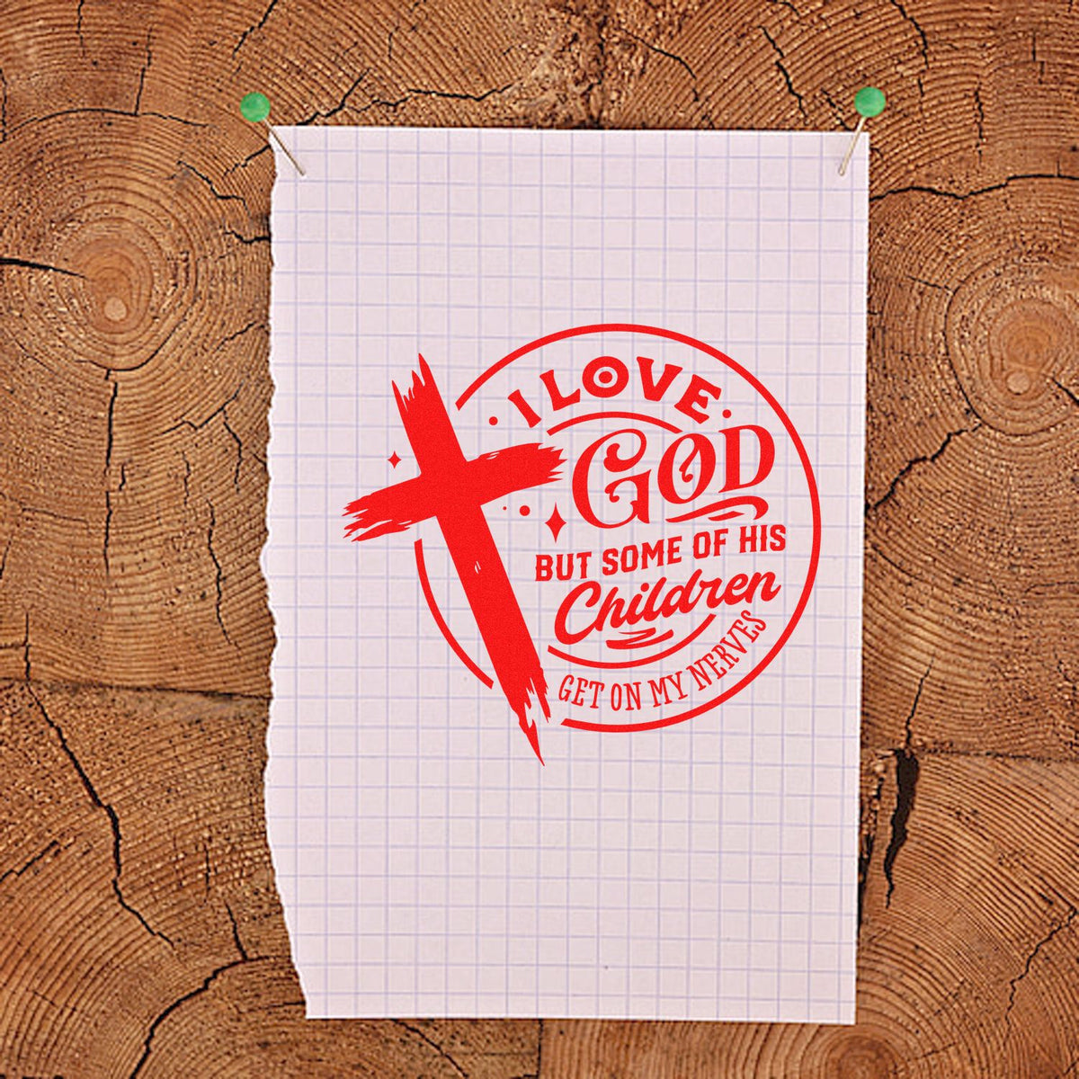 Red Christian stamp seal with cross and quote on white grid paper, pinned to wood background.