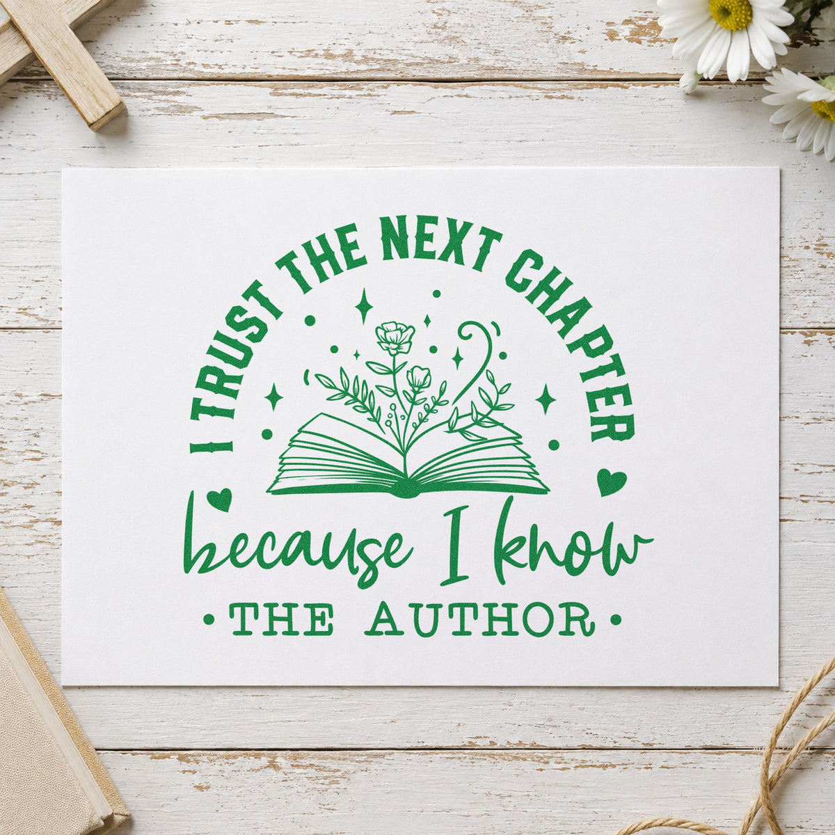 Trust the Author Open Book craft stamp imprint in green ink on a handmade project, one idea being baby shower pages.