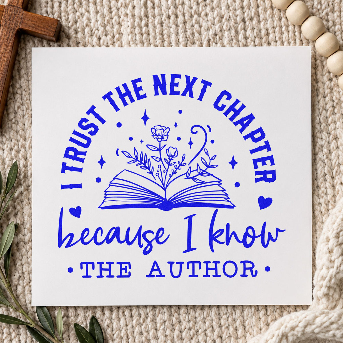 Trust the Author Open Book craft stamp imprinted in blue ink on paper, a design suited to bookshop wrap seals.